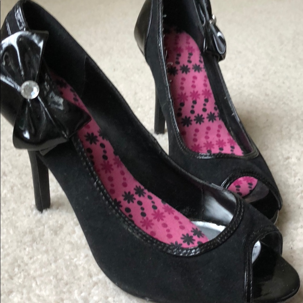 Black suede pumps